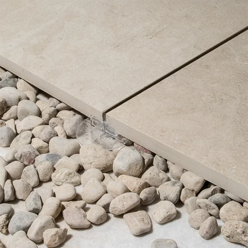 Terč pod dlažbu – pevný, výška 2 mm, transparentní (Ø 64 mm) 1